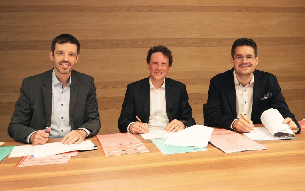 Climeworks' Co-CEOs Jan Wurzbacher & Christoph Gebald, and CFO Andreas Aepli sign financing round.